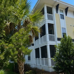an apartment building with trees